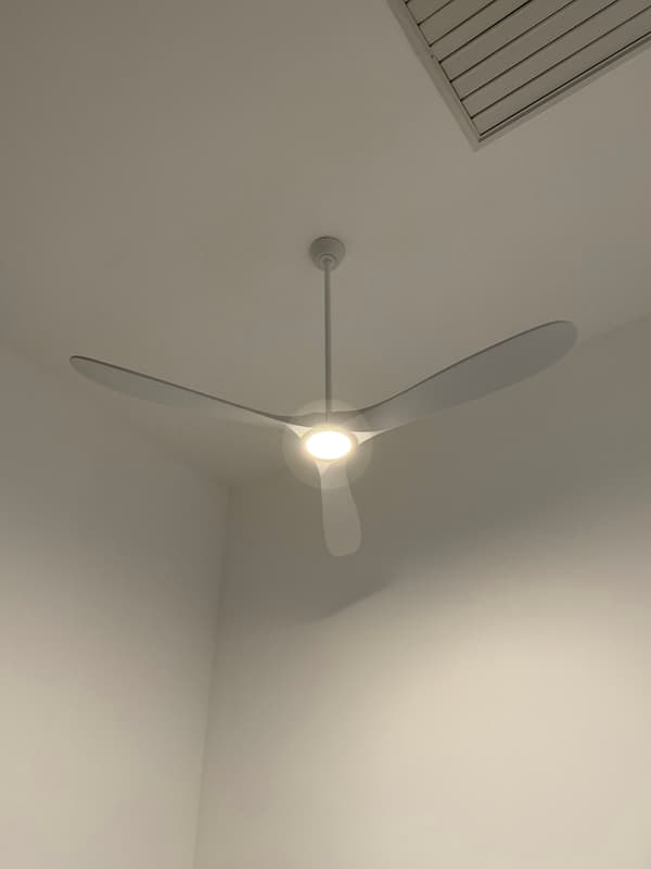 White ceiling fan with an integrated light